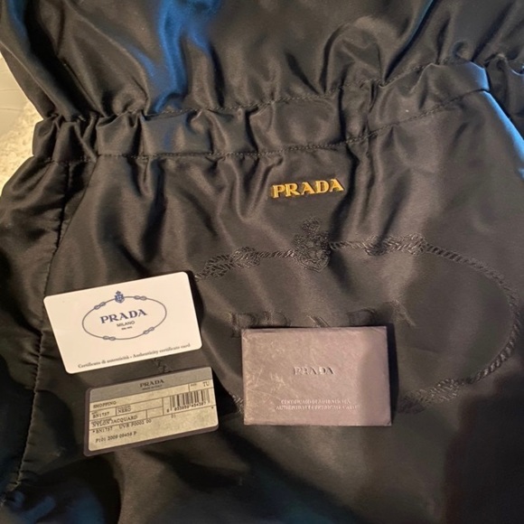 Authentic black Prada bag with draw string. One draw string came off. Clean - Picture 12 of 13